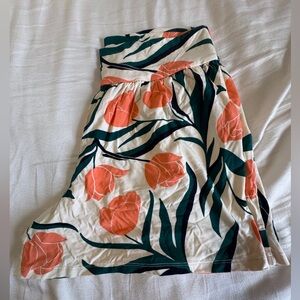 Fighting Eel Cream Skirt with Orange and Green Floral Design